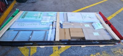 Palletised Terry White Chemmart commercial signage freight delivered to Blue Sky Signs for unpacking and installation as part of a regional NSW brand rollout